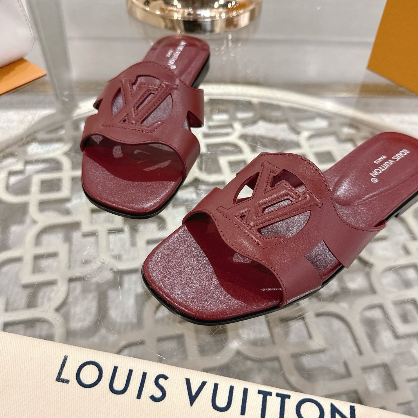 LOUIS VUITTON ISOLA FLAT SLIDE IN JAM RED CALFSKIN