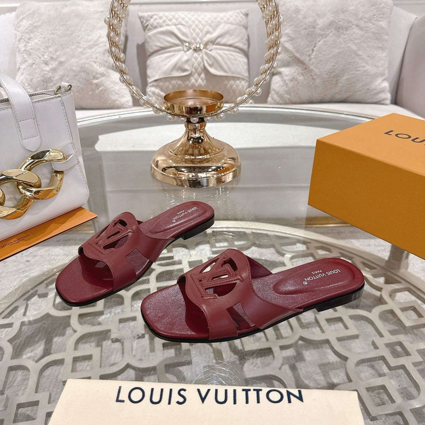 LOUIS VUITTON ISOLA FLAT SLIDE IN JAM RED CALFSKIN