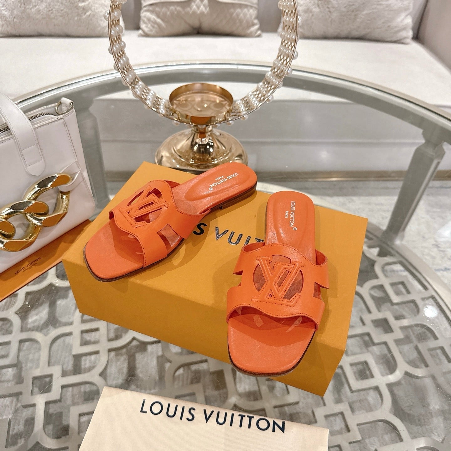LOUIS VUITTON ISOLA FLAT SLIDE IN VIVID ORANGE CALFSKIN