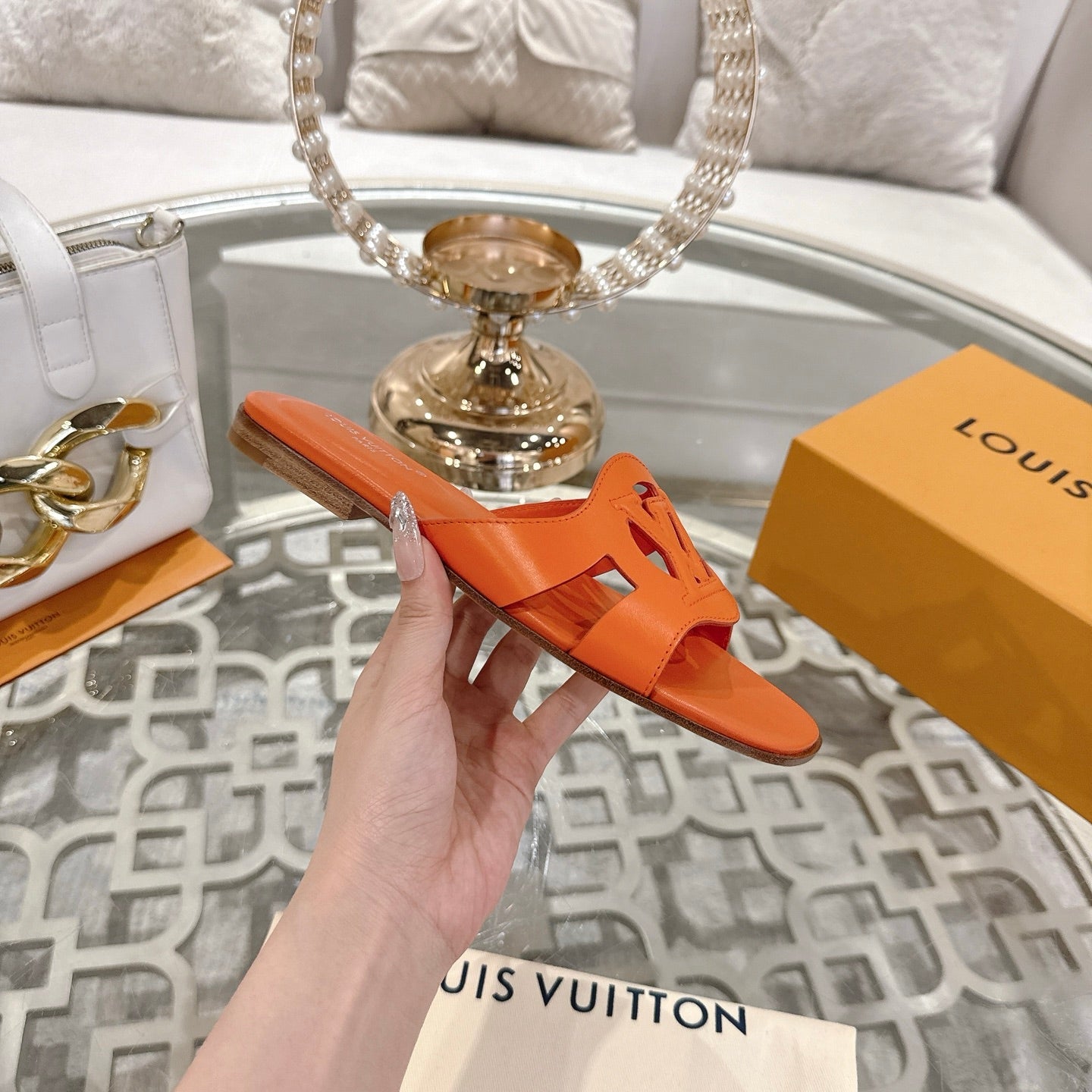 LOUIS VUITTON ISOLA FLAT SLIDE IN VIVID ORANGE CALFSKIN