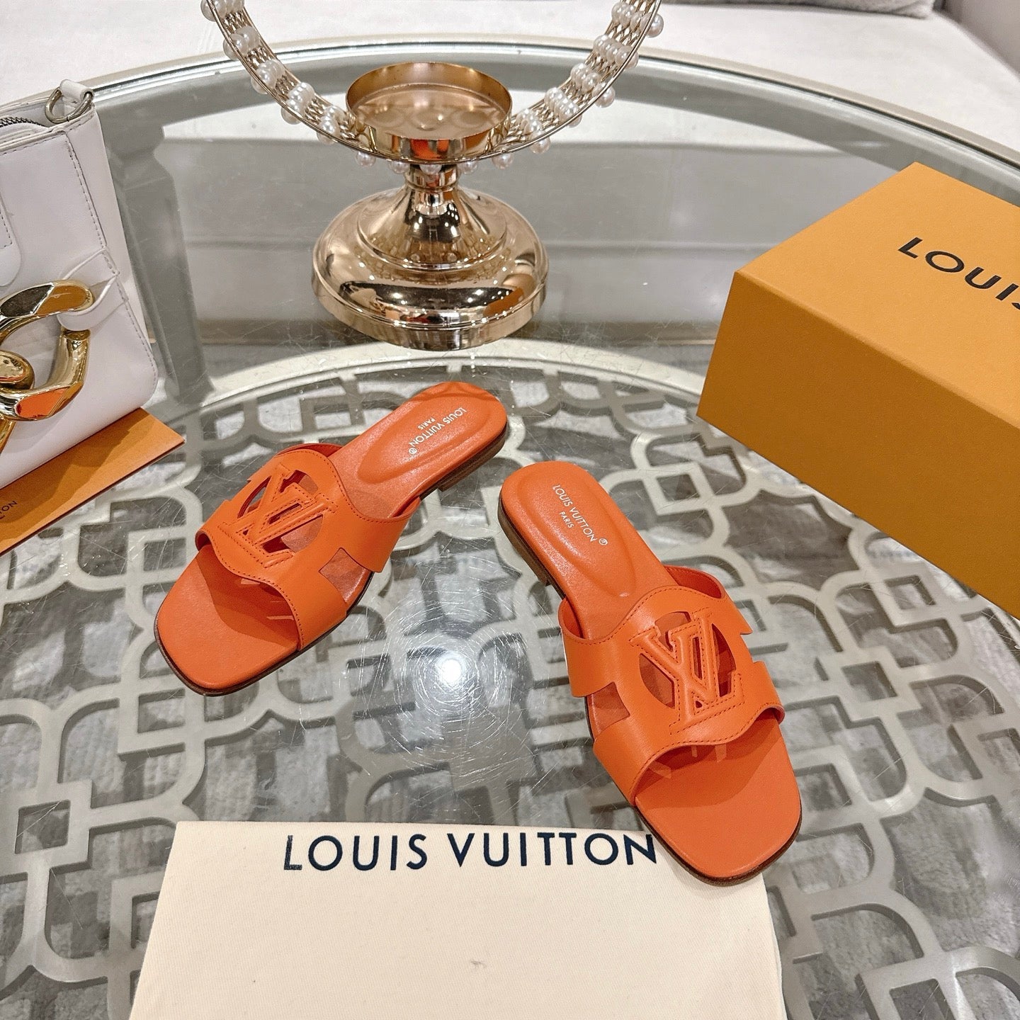 LOUIS VUITTON ISOLA FLAT SLIDE IN VIVID ORANGE CALFSKIN
