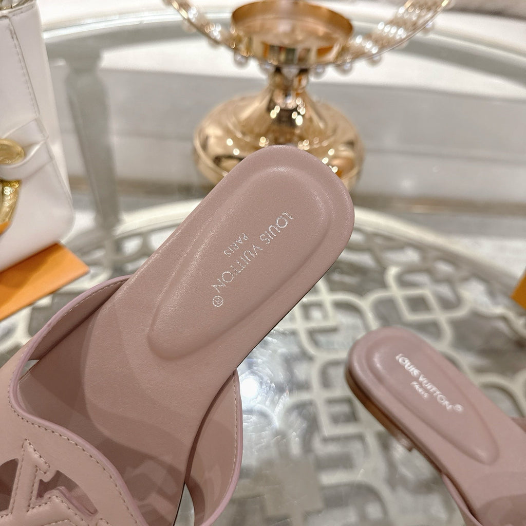 LOUIS VUITTON ISOLA FLAT SLIDE IN DUSTY PINK CALFSKIN