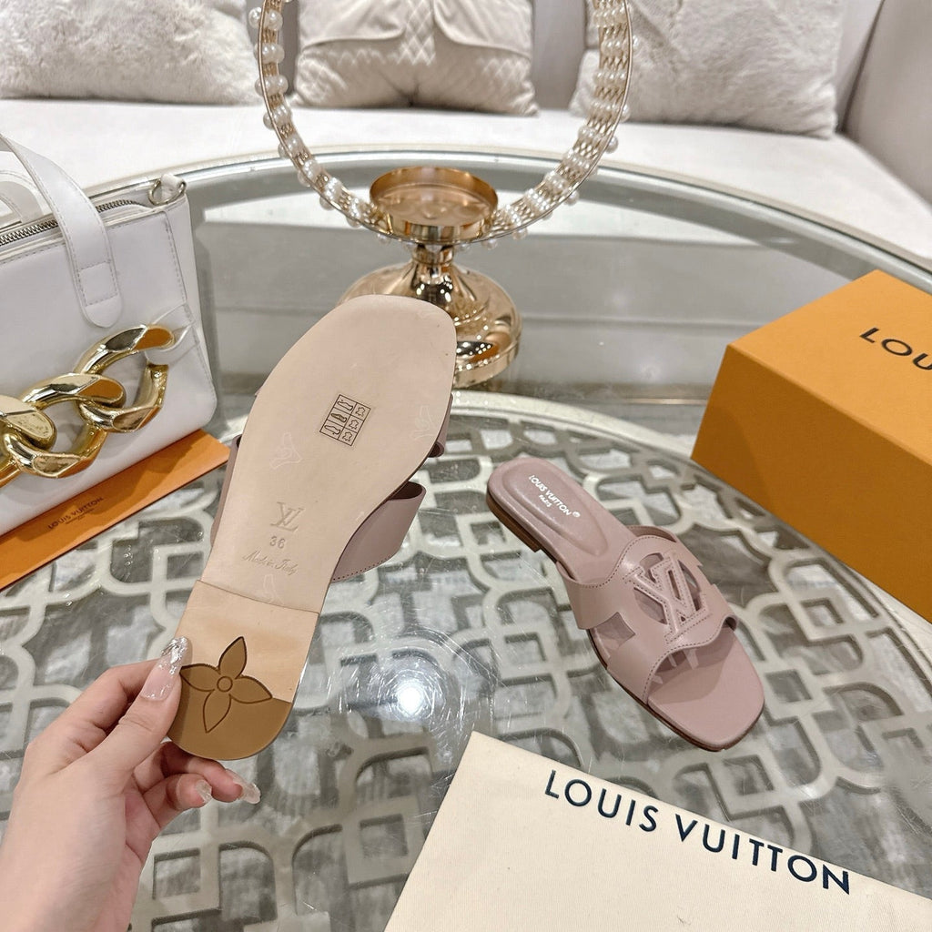 LOUIS VUITTON ISOLA FLAT SLIDE IN DUSTY PINK CALFSKIN