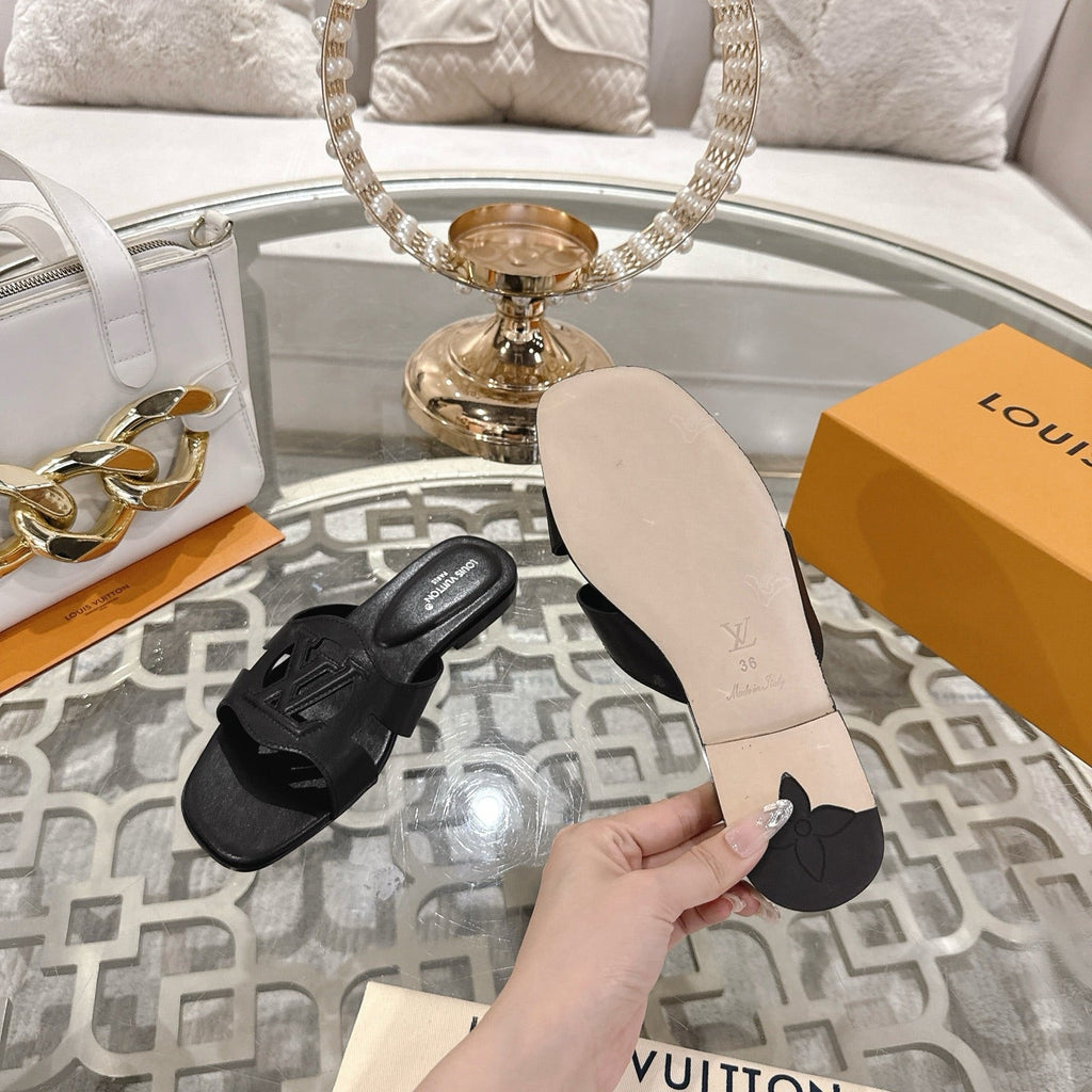 LOUIS VUITTON ISOLA FLAT SLIDE IN BLACK CALFSKIN