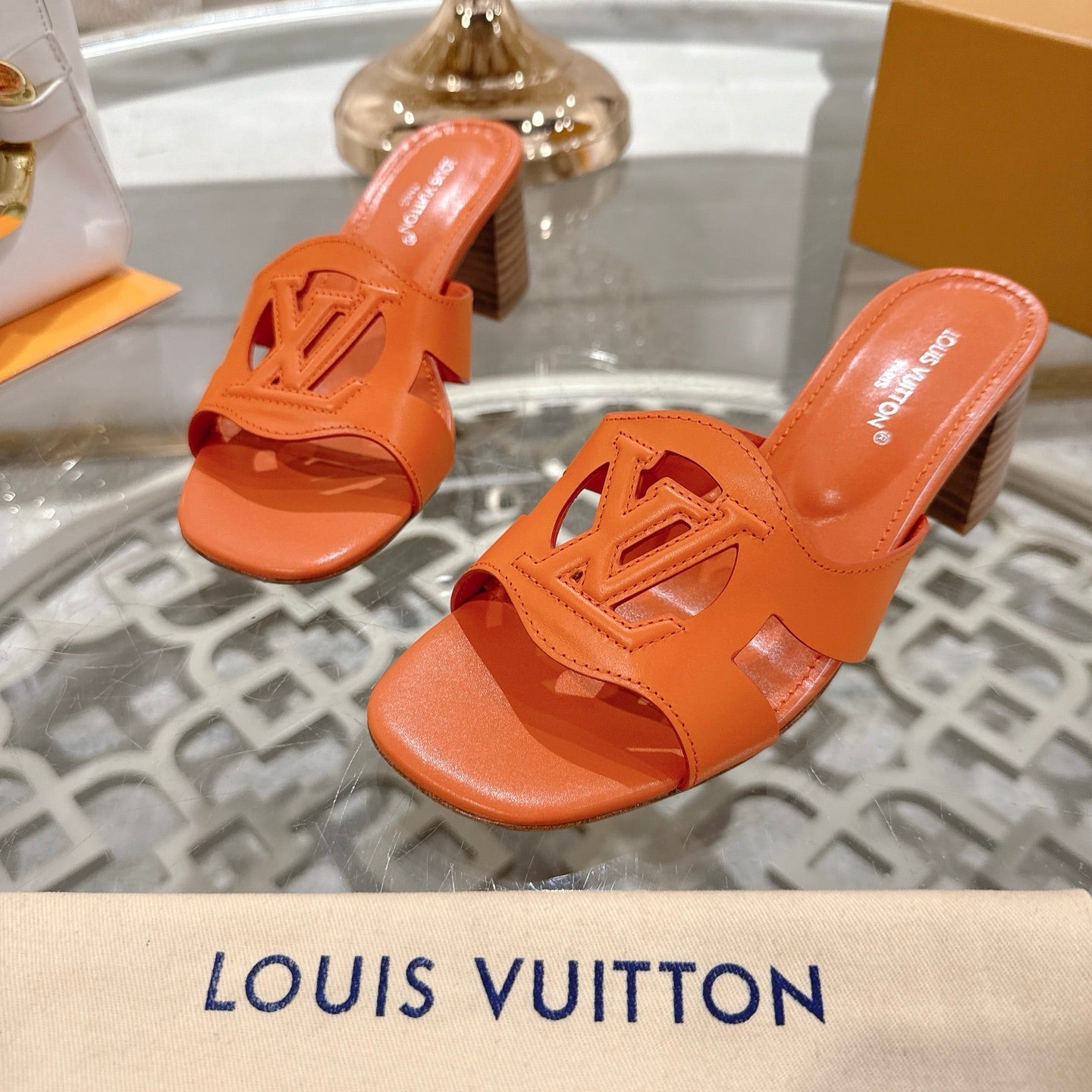 LOUIS VUITTON ISOLA HIGH 55 MM MULE IN VIVID ORANGE CALFSKIN
