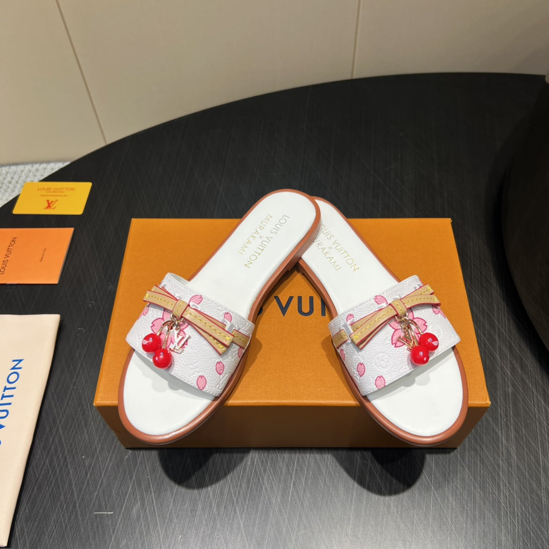 LOUIS VUITTON LV SLIDE SANDALS 25S IN WHITE CALFSKIN WITH CHERRY BLOSSOM BUCKLE