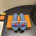 LOUIS VUITTON LV SLIDE SANDALS 25S IN DARK BLUE DENIM AND CALFSKIN WITH CHERRY BLOSSOM BUCKLE