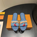 LOUIS VUITTON LV SLIDE SANDALS 25S IN BLUE DENIM AND CALFSKIN WITH CHERRY BLOSSOM BUCKLE