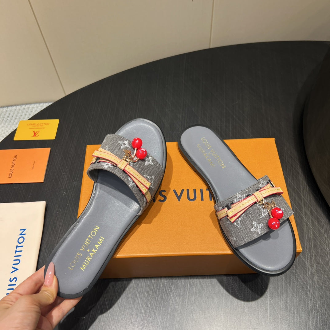 LOUIS VUITTON LV SLIDE SANDALS 25S IN DARK GREY DENIM AND CALFSKIN WITH CHERRY BLOSSOM BUCKLE