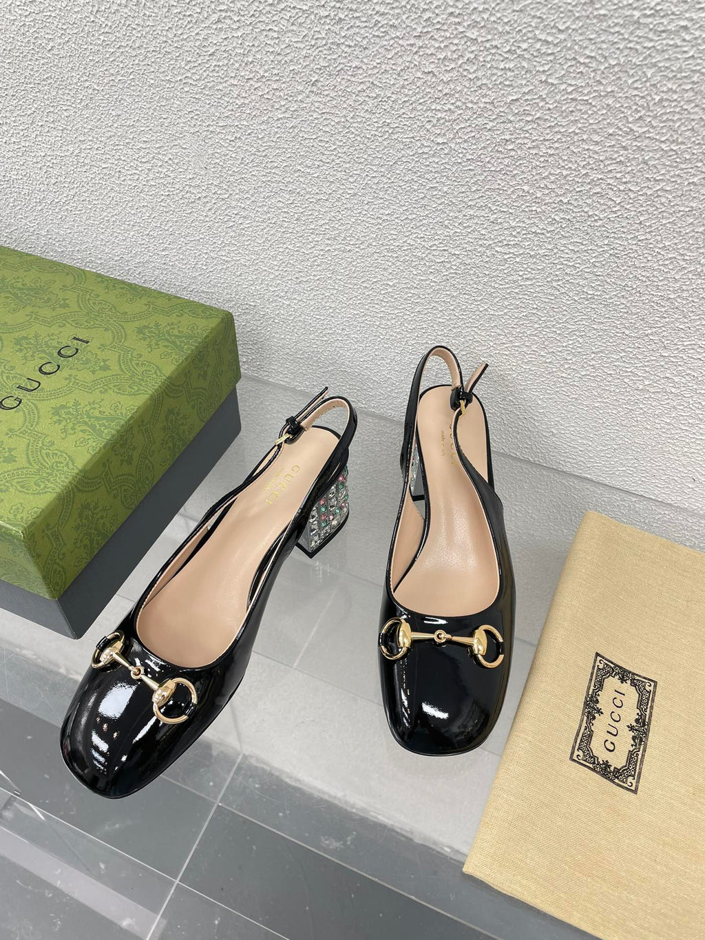 GUCCI WOMEN'S HORSEBIT SLINGBACK IN BLACK CALFSKIN WITH RHINSTONES