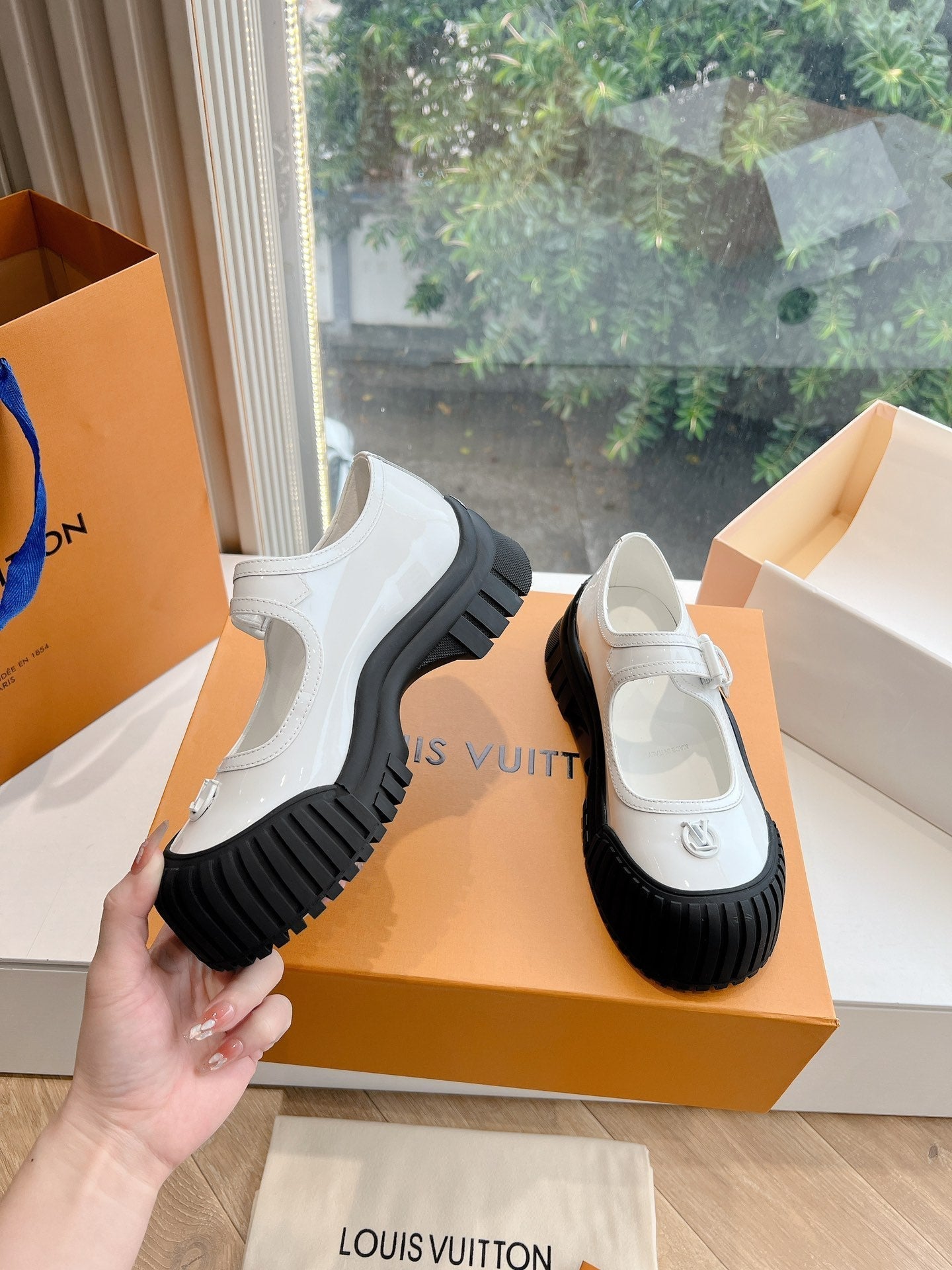 LOUIS VUITTON RUBY FLAT MARY JANE IN WHITE PATENT CALFSKIN