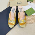 GUCCI Women's Horsebit mid-heel slide sandal in Gold