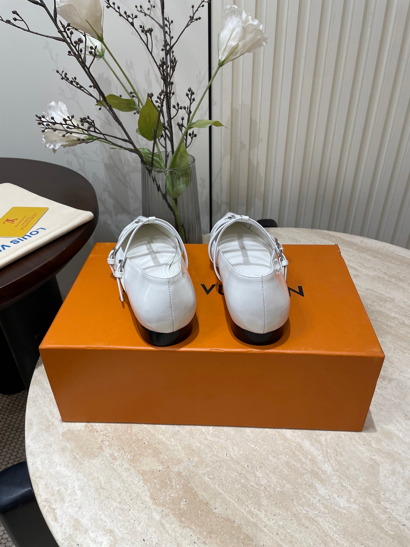 LOUIS VUITTON POINTED-TOE TRIPLE-STRAP BALLET FLAT IN WHITE PATENT CALFSKIN