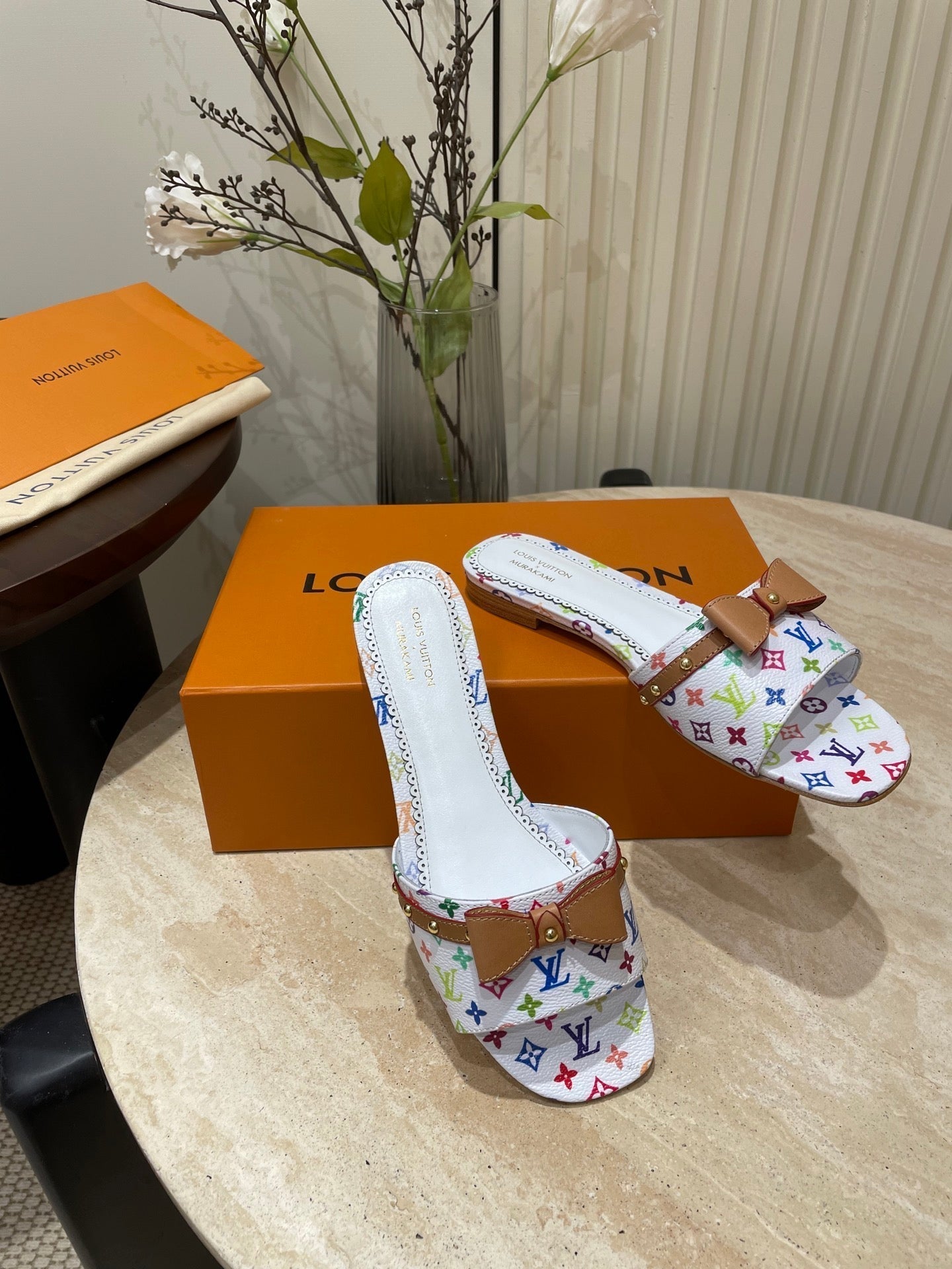 LOUIS VUITTON FLAT MULES IN WHITE MONOGRAM LAMBSKIN