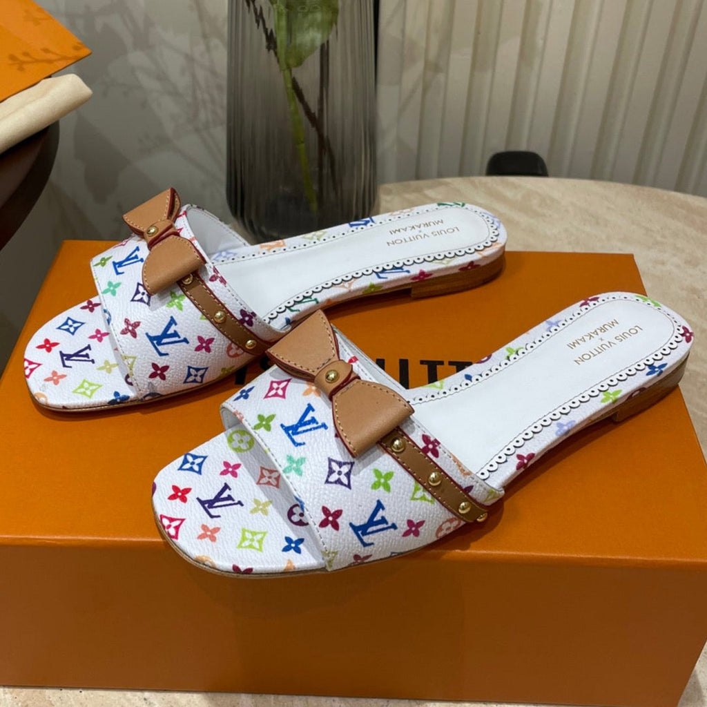 LOUIS VUITTON FLAT MULES IN WHITE MONOGRAM LAMBSKIN