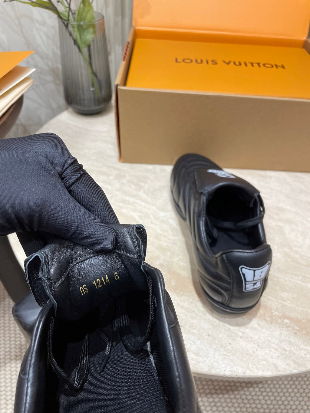 LOUIS VUITTON FOOTPRINT SOCCER SNEAKER IN BLACK CALFSKIN