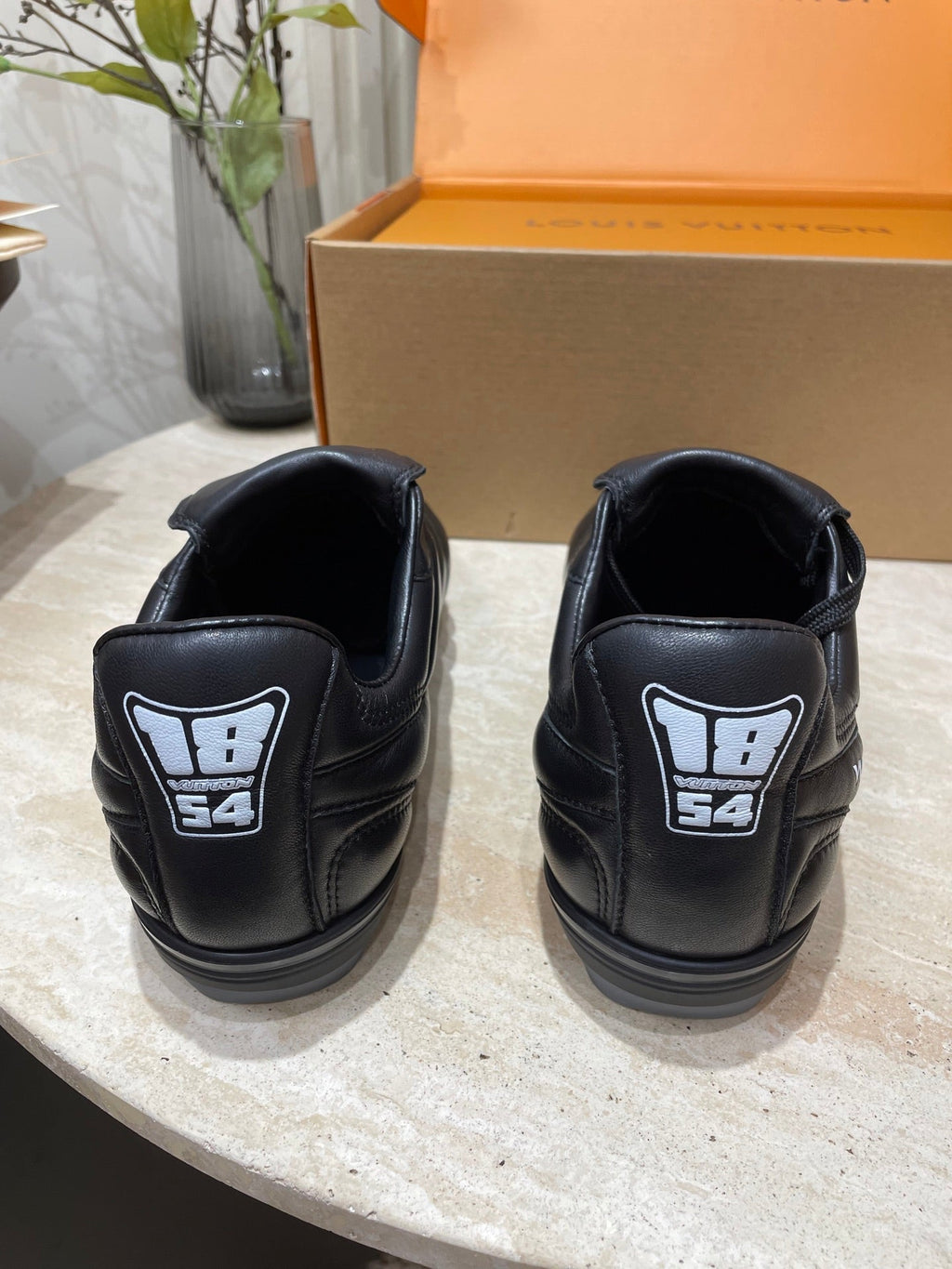 LOUIS VUITTON FOOTPRINT SOCCER SNEAKER IN BLACK CALFSKIN