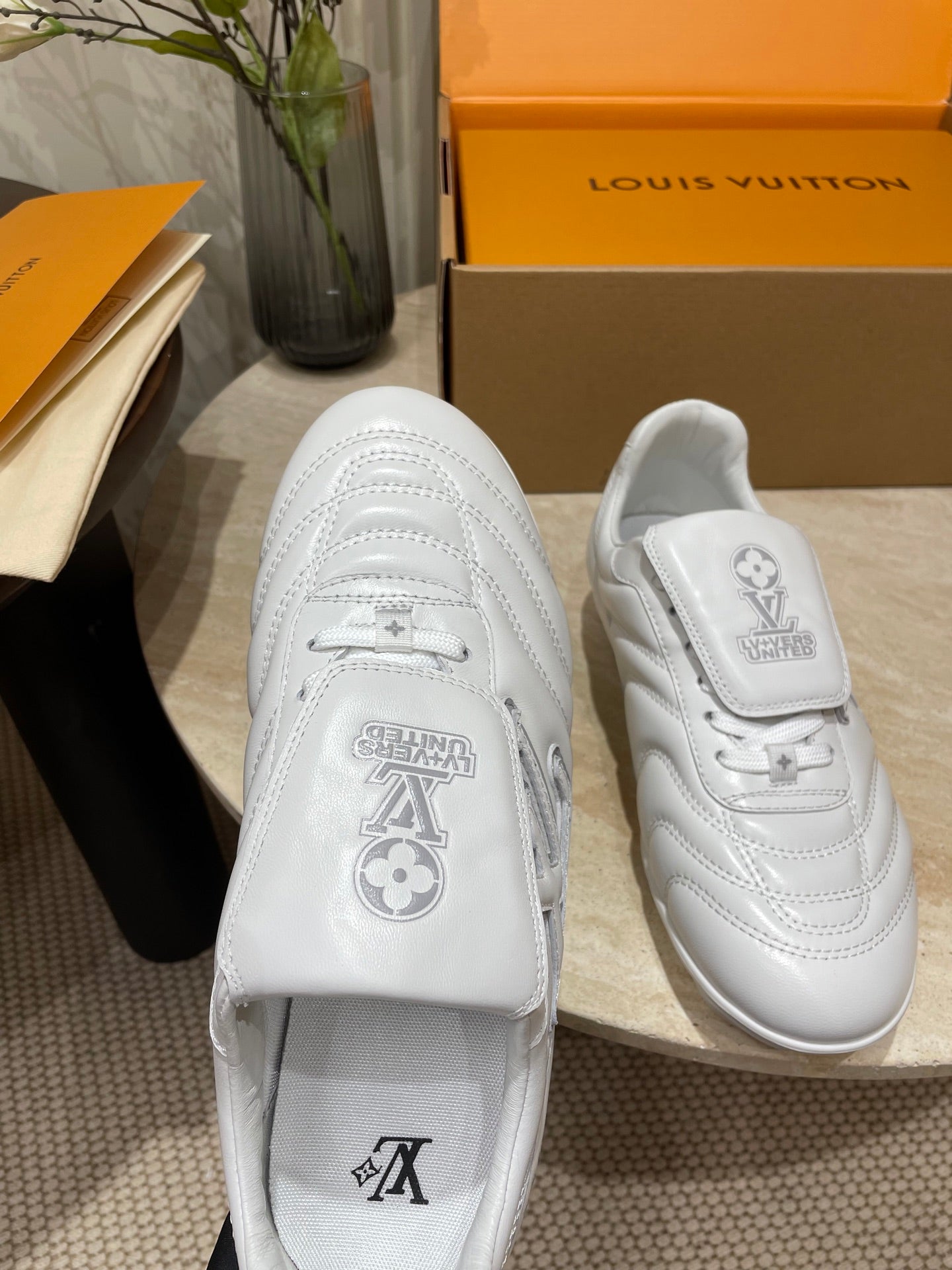 LOUIS VUITTON FOOTPRINT SOCCER SNEAKER IN WHITE CALFSKIN