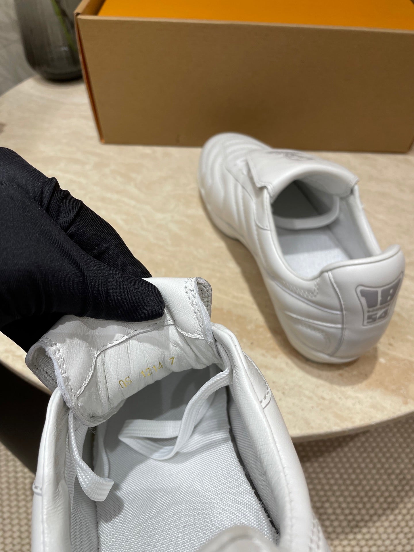 LOUIS VUITTON FOOTPRINT SOCCER SNEAKER IN WHITE CALFSKIN