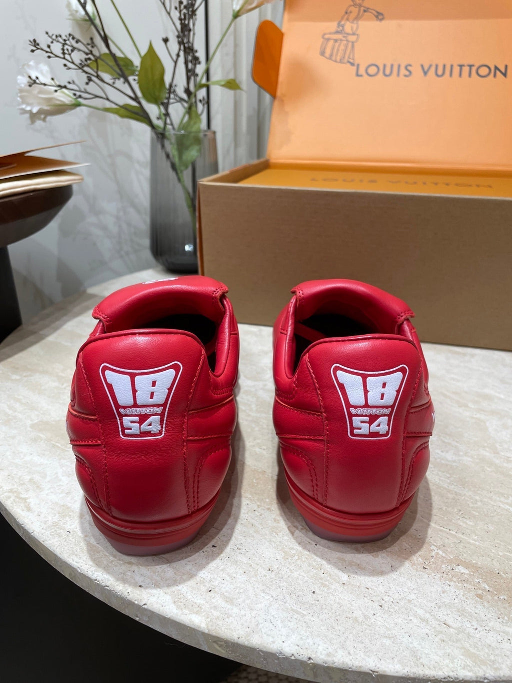 LOUIS VUITTON FOOTPRINT SOCCER SNEAKER IN CHERRY RED CALFSKIN