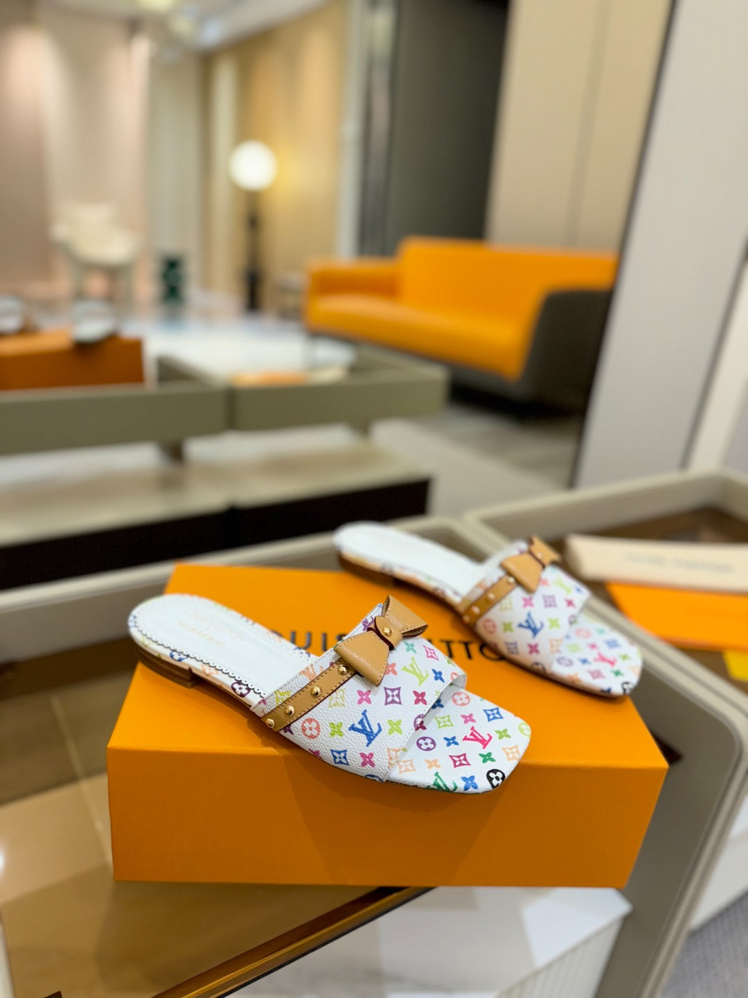 LOUIS VUITTON LV X TM 6AM FLAT MULE IN WHITE MONOGRAM CALFSKIN
