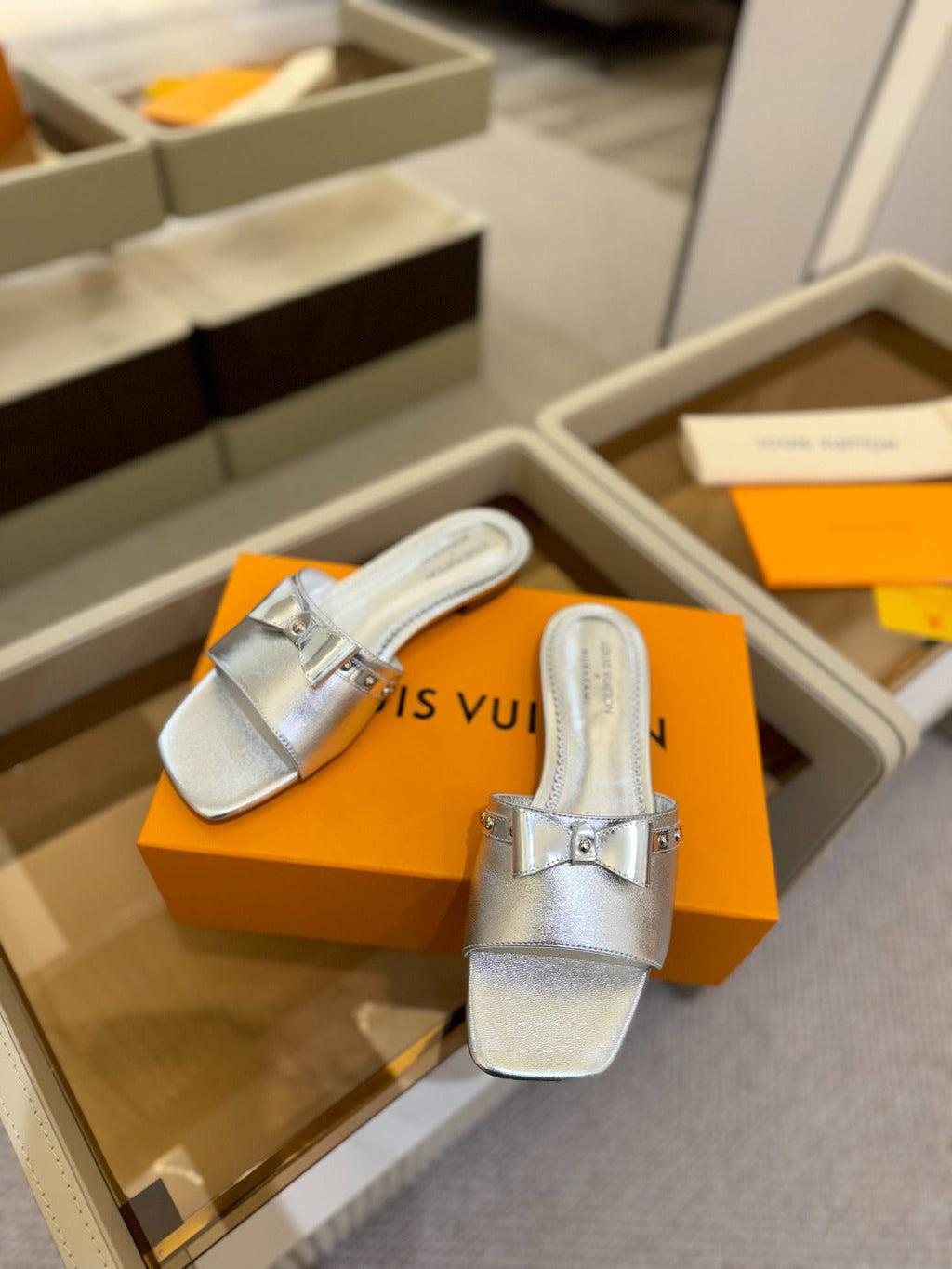 LOUIS VUITTON LV X TM 6AM FLAT MULE IN SILVER CALFSKIN