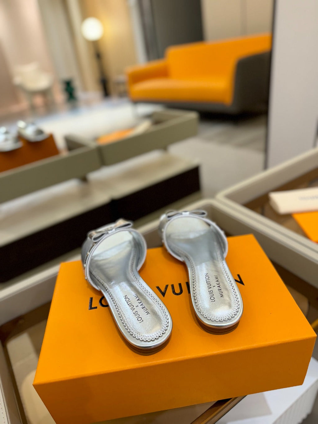 LOUIS VUITTON LV X TM 6AM FLAT MULE IN SILVER CALFSKIN