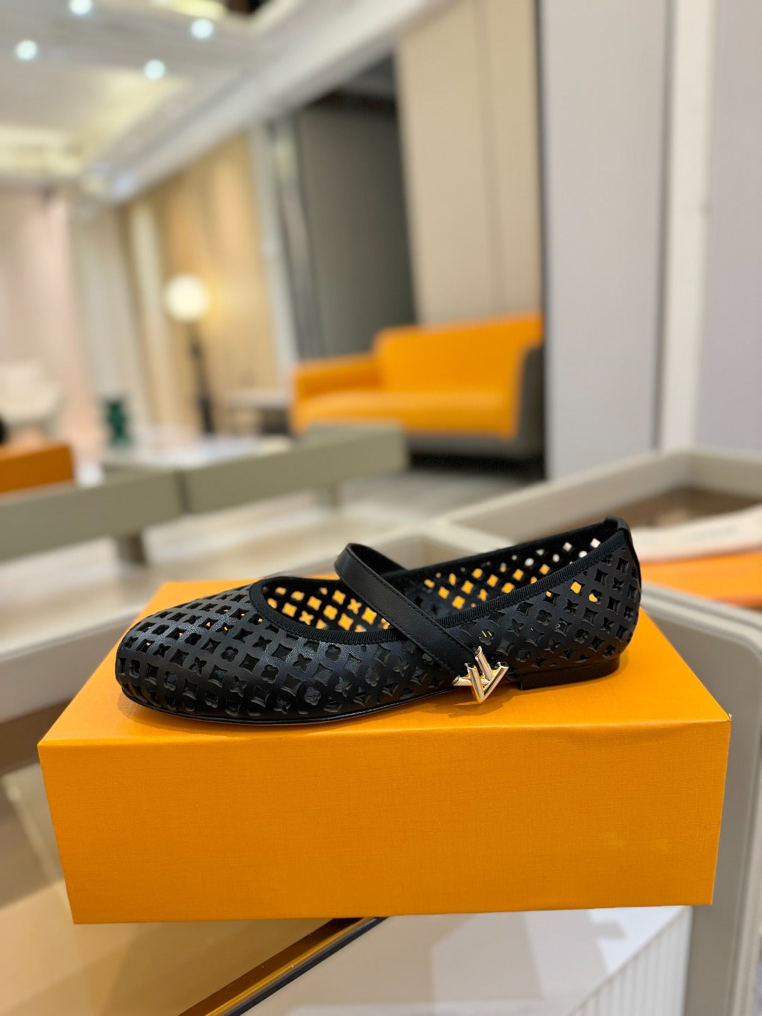 LOUIS VUITTON ROMY FLAT BALLERINA IN BLACK MESH CALFSKIN