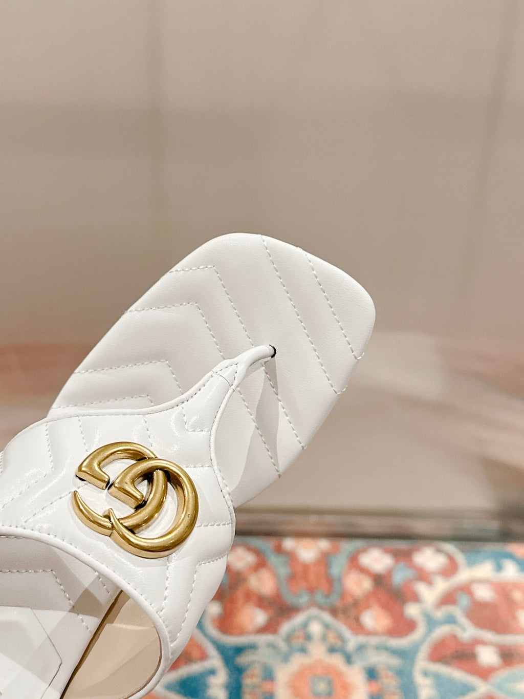GUCCI HIGH THONG MULE 55MM IN WHITE CALFSKIN WITH GOLD HARDWARE