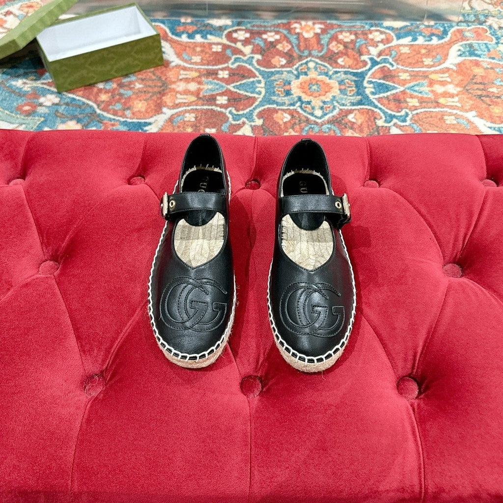 GUCCI CROSS STRAP FLAT SHOES IN BLACK CALFSKIN WITH STRAW SOLE