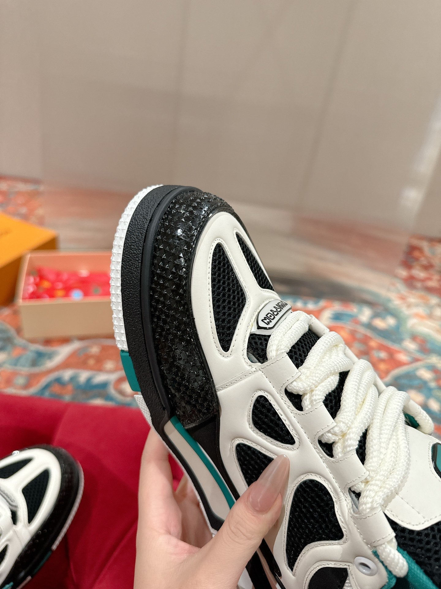 LOUIS VUITTON LV SKATE SNEAKER IN WHITE MIX BLACK AND PERSIAN GREEN CALFSKIN
