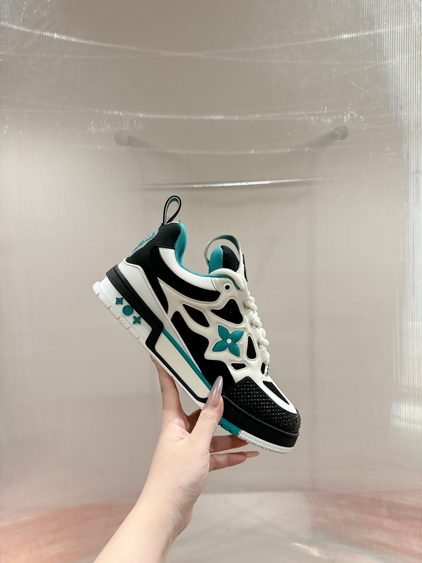 LOUIS VUITTON LV SKATE SNEAKER IN WHITE MIX BLACK AND PERSIAN GREEN CALFSKIN