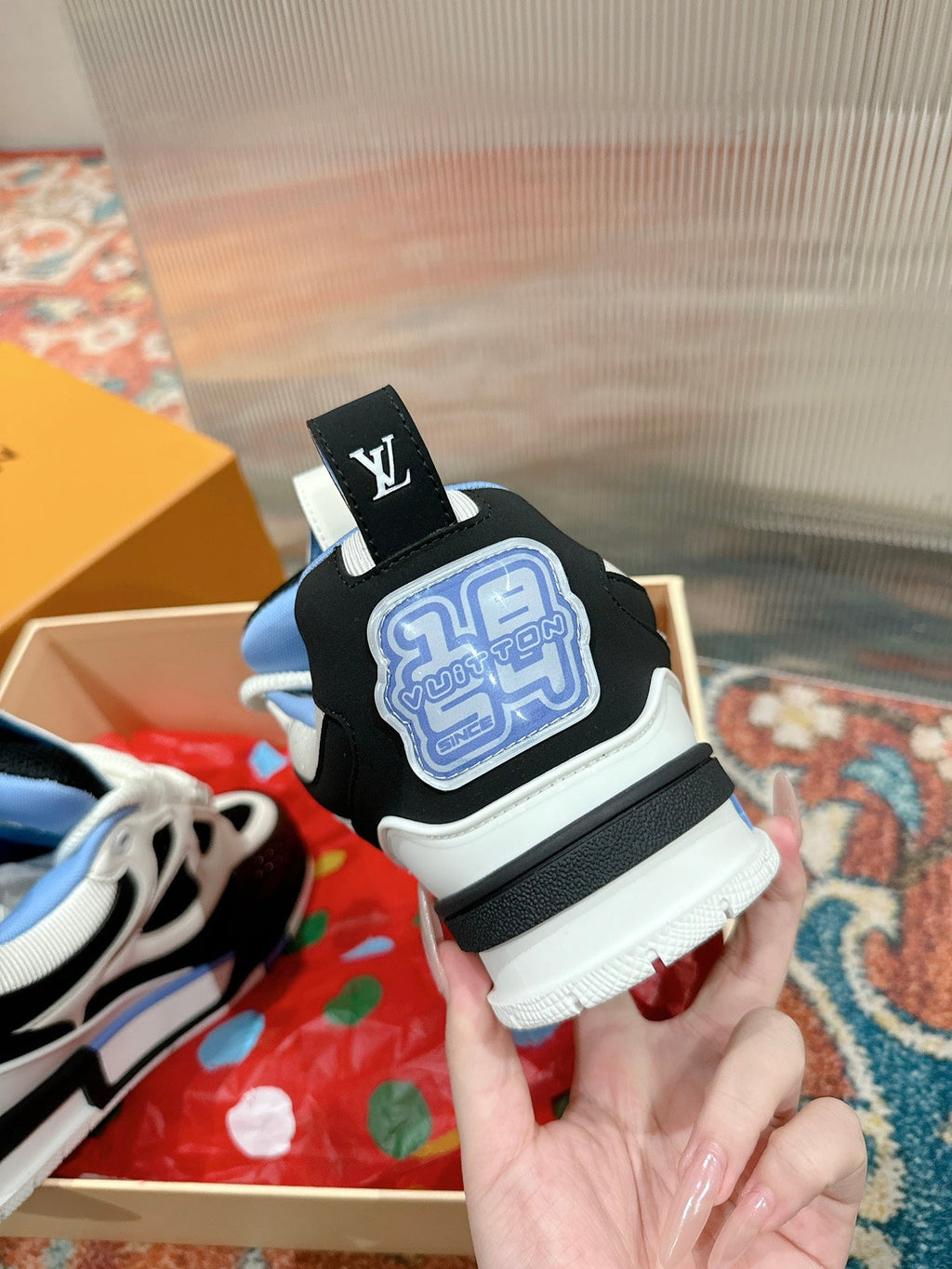 LOUIS VUITTON LV SKATE SNEAKER IN WHITE MIX BLACK AND SKY BLUE CALFSKIN