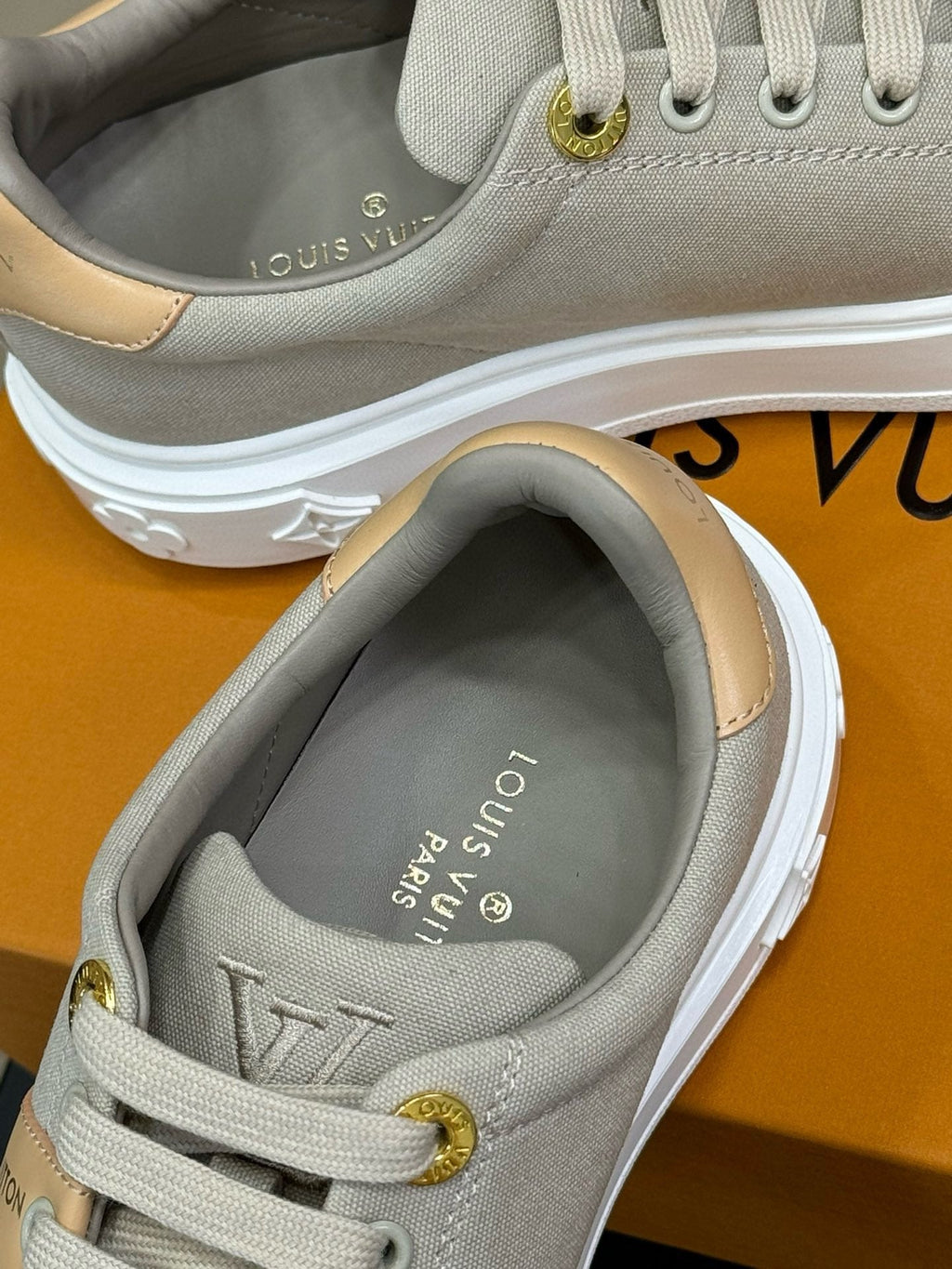 LOUIS VUITTON LV TIME OUT SNEAKER IN PASTEL GRAY MIX MACAROON GOLD CANVAS