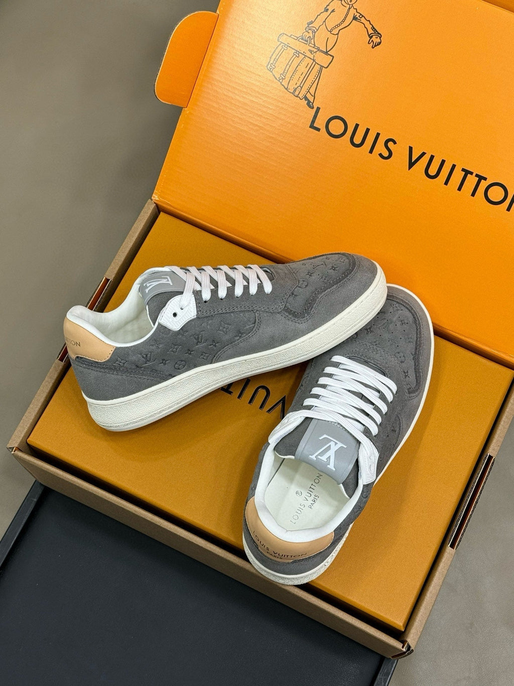 LOUIS VUITTON STADIUM SNEAKER IN DOVE GRAY EMBOSSED MONOGRAM SUEDE