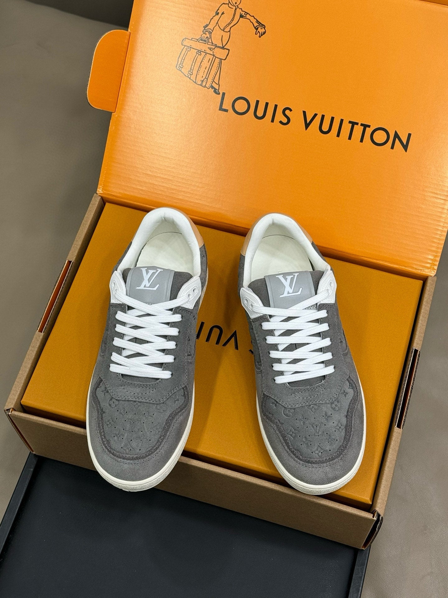 LOUIS VUITTON STADIUM SNEAKER IN DOVE GRAY EMBOSSED MONOGRAM SUEDE