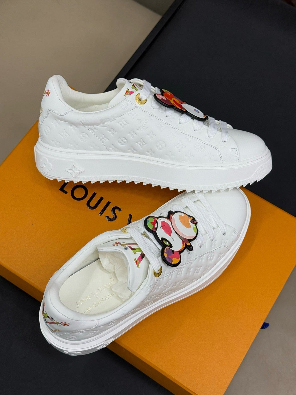LOUIS VUITTON TIME OUT SNEAKER IN WHITE EMBOSSED MONOGRAM CALFSKIN