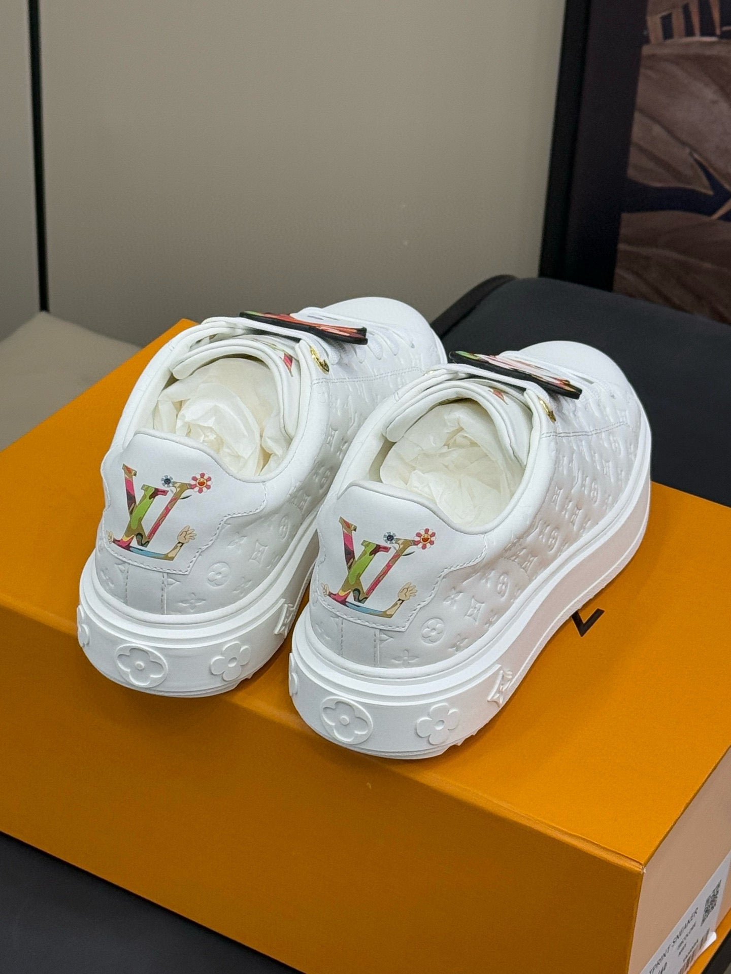 LOUIS VUITTON TIME OUT SNEAKER IN WHITE EMBOSSED MONOGRAM CALFSKIN