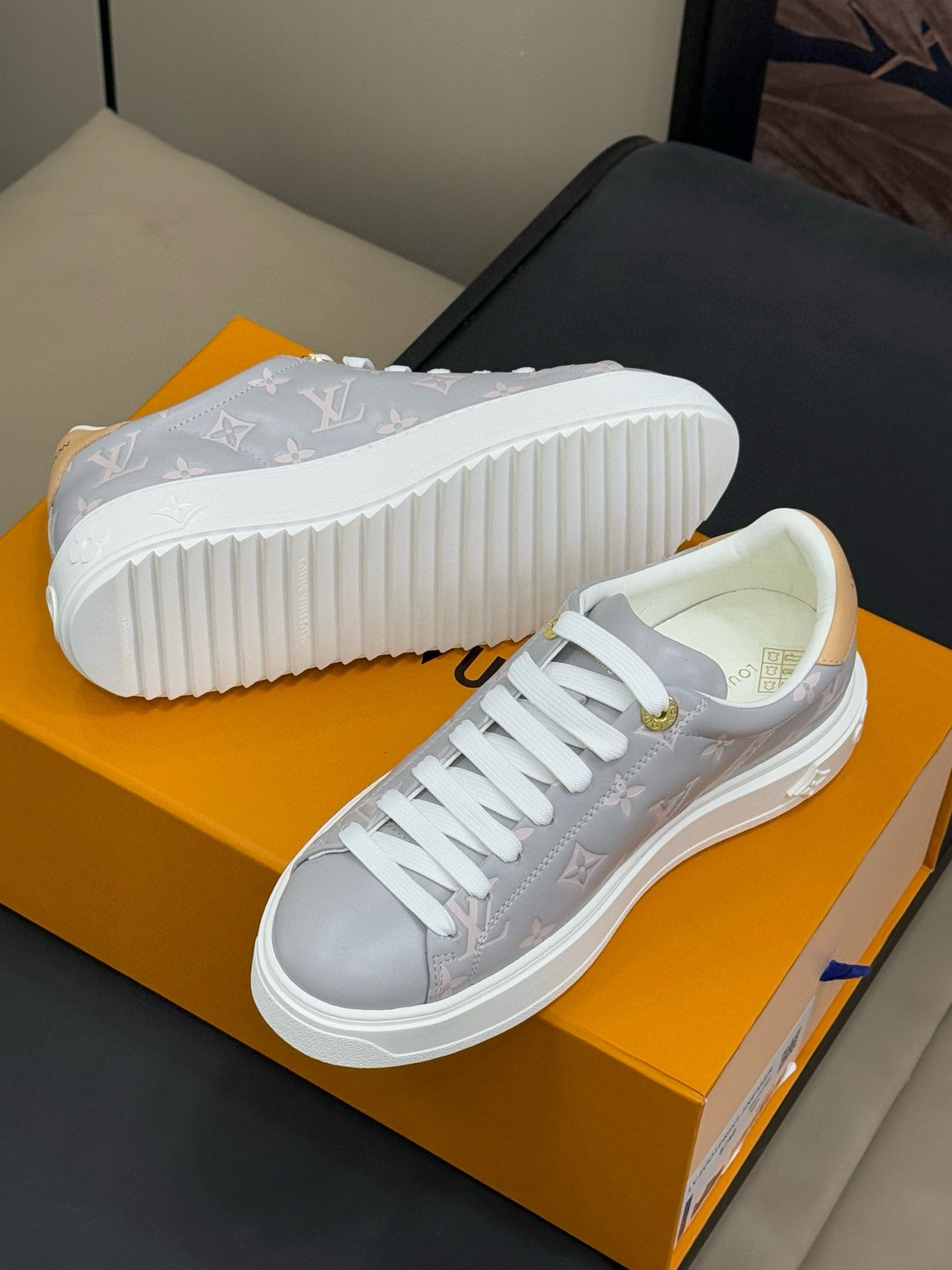 LOUIS VUITTON TIME OUT SNEAKER IN COOL GRAY EMBOSSED MONOGRAM CALFSKIN