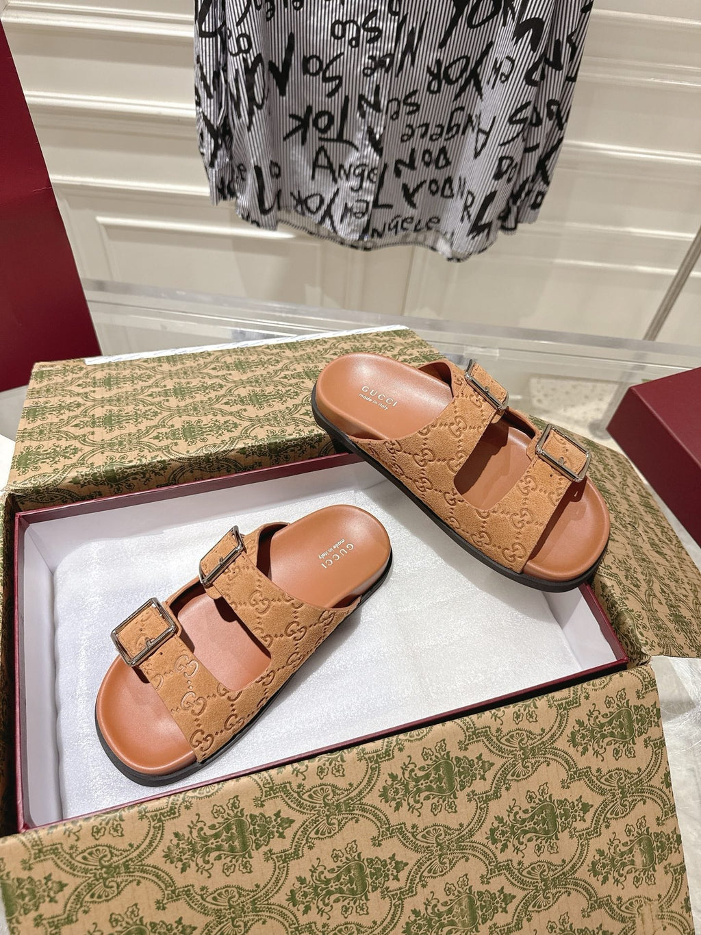 GUCCI SANDALS IN BURNT ORANGE SUEDE EMBOSSED LOGO SILVER HARDWARE