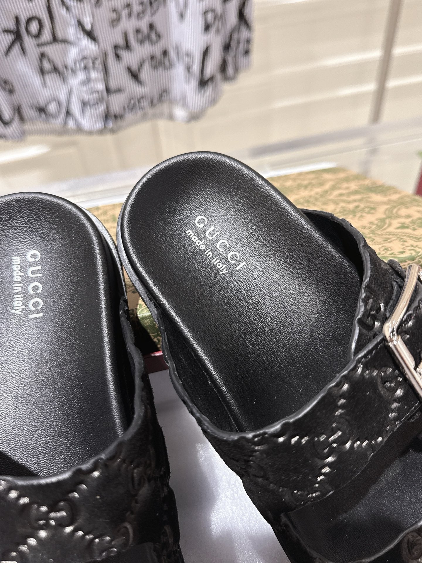 GUCCI SANDALS IN BLACK SUEDE EMBOSSED LOGO SILVER HARDWARE
