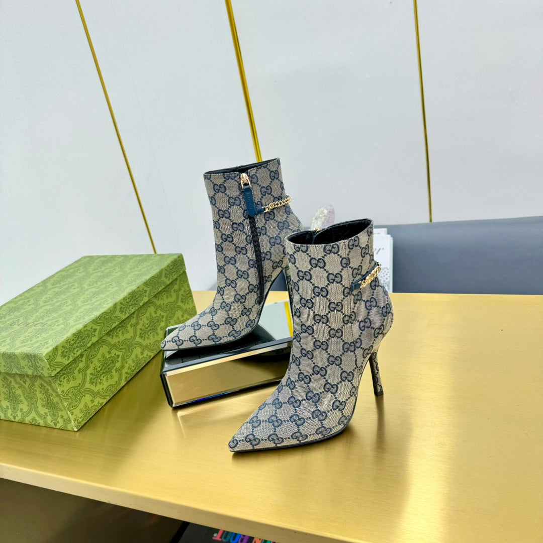 GUCCI SIGNORIA ANKLE BOOT IN PALE GRAY MONOGRAM CANVAS