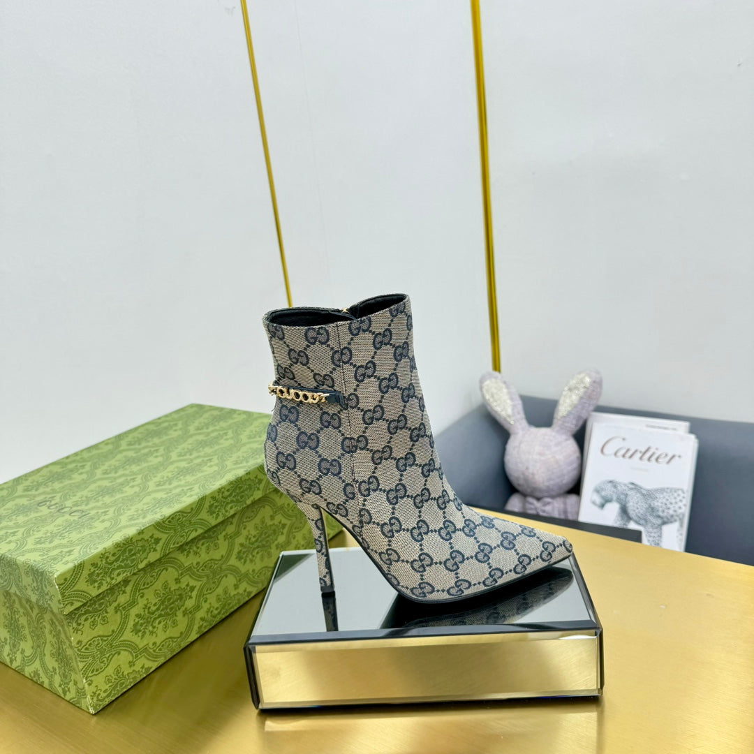 GUCCI SIGNORIA ANKLE BOOT IN PALE GRAY MONOGRAM CANVAS