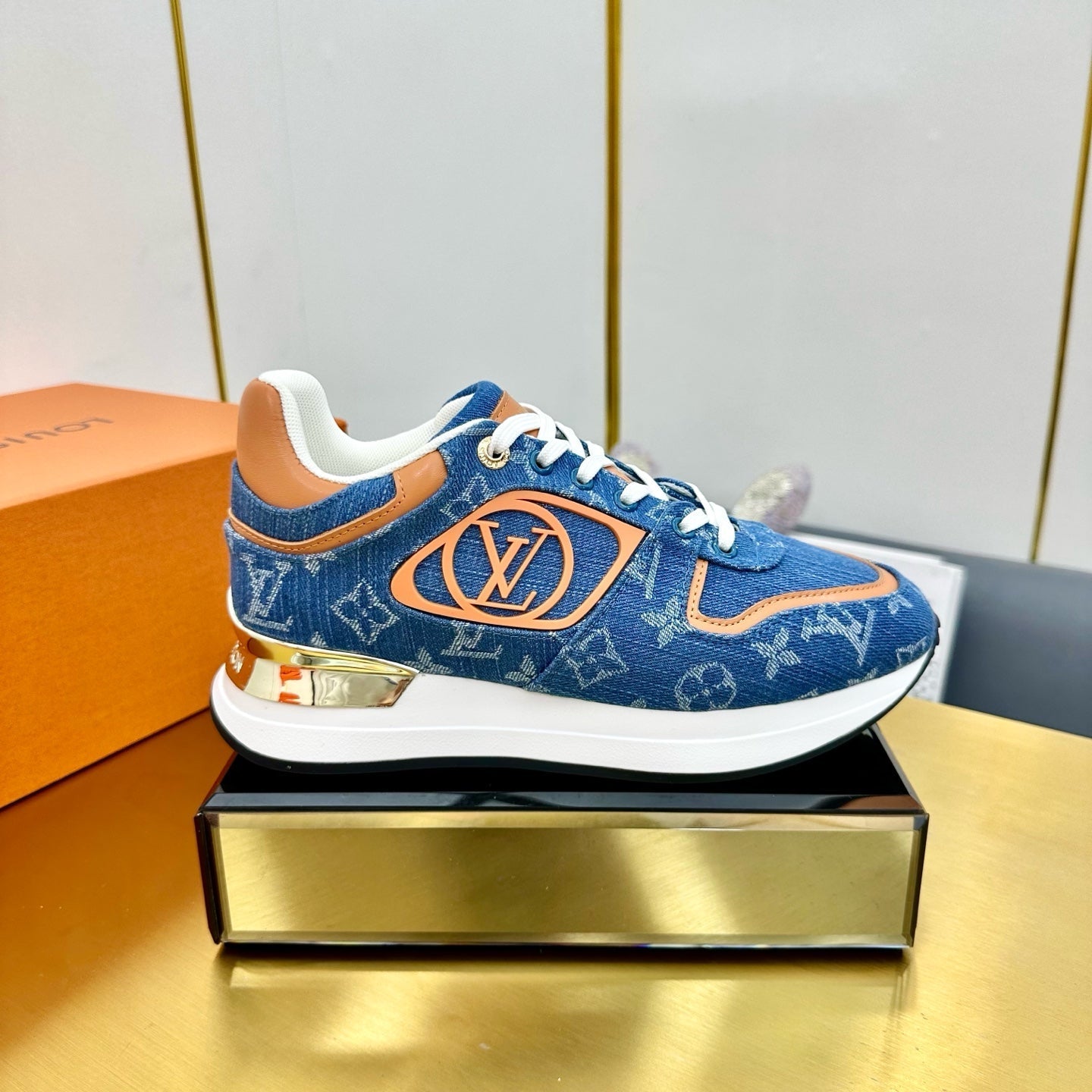 LOUIS VUITTON NEO RUN AWAY SNEAKER IN CLASSIC BLUE MONOGRAM DENIM AND ORANGE CALFSKIN