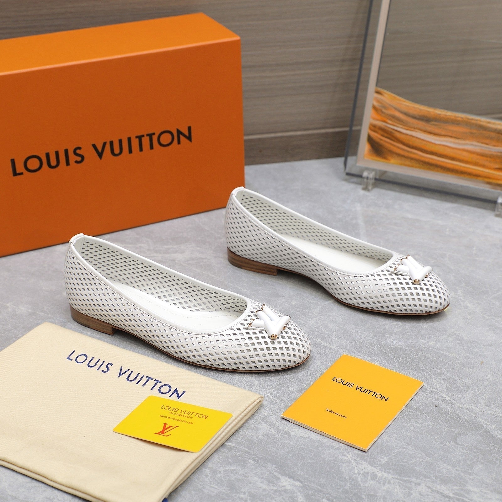 LOUIS VUITTON LV WOMEN'S BALLET FLAT IN WHITE CALFSKIN WITH PERFORATION CRAFTMANSHIP