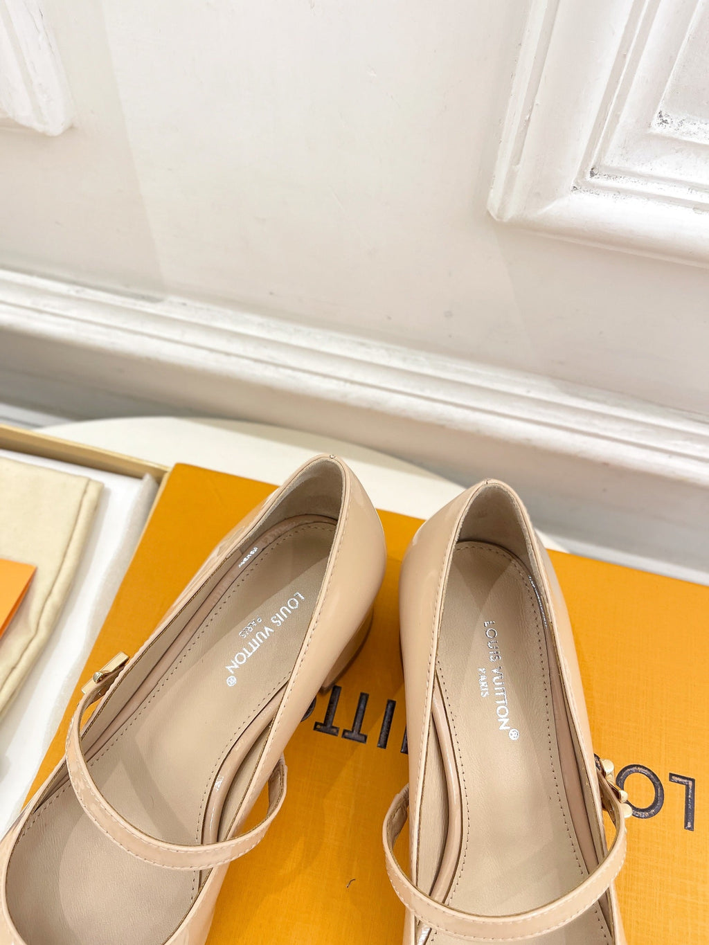 LOUIS VUITTON LV WOMEN ROMY HIGH BALLERINA IN GLOSSY BEIGE LAMBSKIN