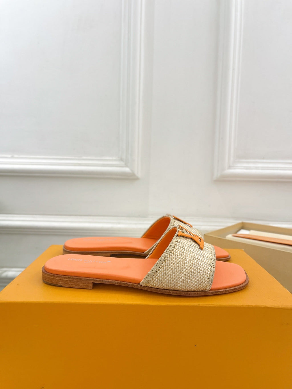 LOUIS VUITTON LV WOMEN CAPRI FLAT MULES IN TIGER ORANGE LEATHER AND RAFFIA
