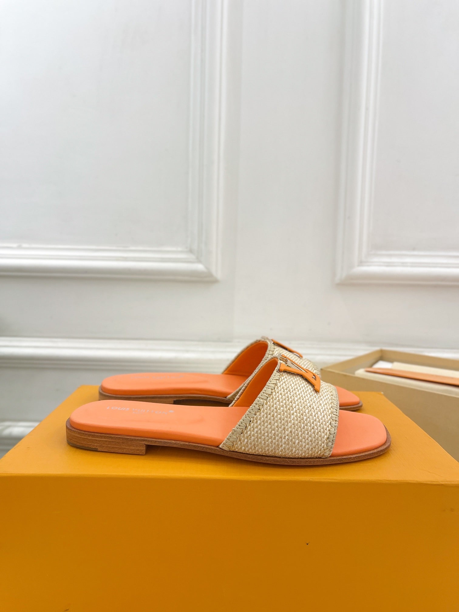 LOUIS VUITTON LV WOMEN CAPRI FLAT MULES IN TIGER ORANGE LEATHER AND RAFFIA